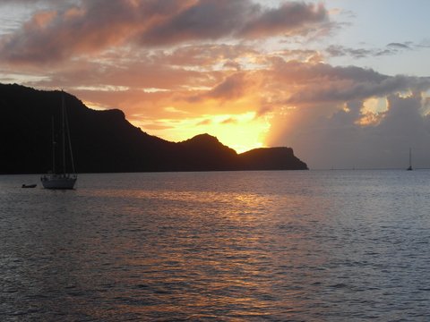 Enjoying the sunset on gorgeous catamaran Cool Runnings. This could be your home while sailing the St-Vincent to Grenada Sailing Itinerary
